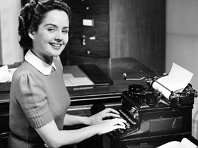 Retro fifties woman typing